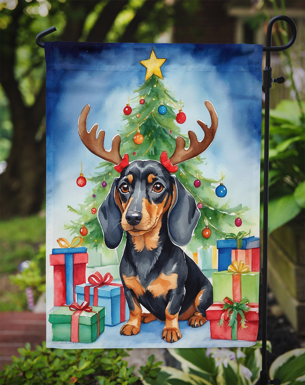 Black and Tan Dachshund Christmas Garden Flag – Dog in Reindeer Antlers with Tree & Gifts